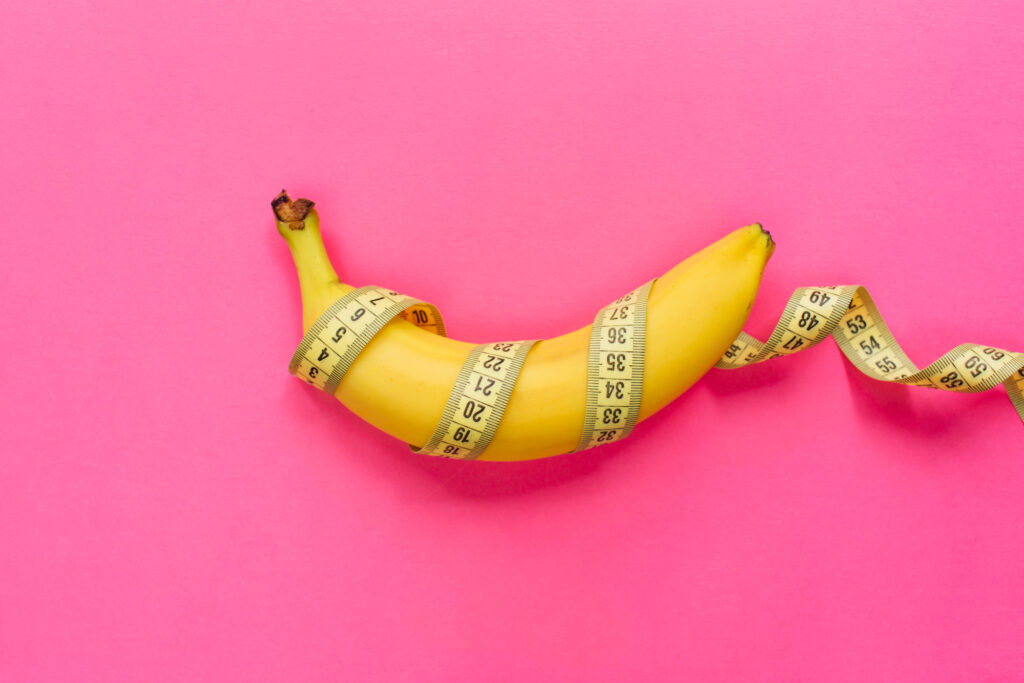 a banana with a measuring tape
