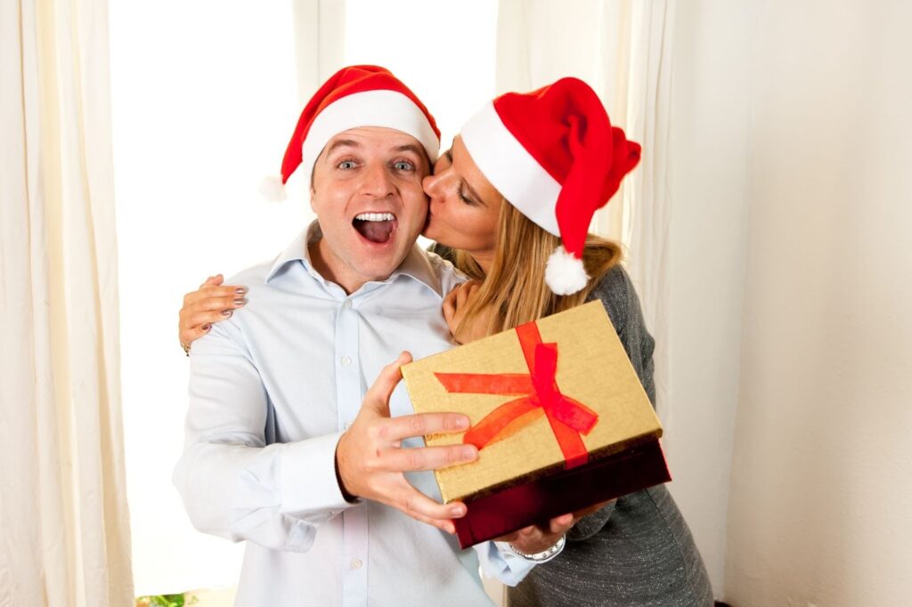 couple laughing with a gift